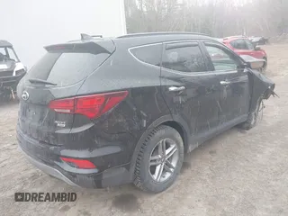 2018 Hyundai Santa Fe 2.4L z VIN 5NMZUDLB7JH098638, wystawiony jako IAAI lot #42055793 z przebiegiem 63 516 mil mil oraz . Historia ofert i sprzedaży dostępna na DreamBid. Obrazek 4.