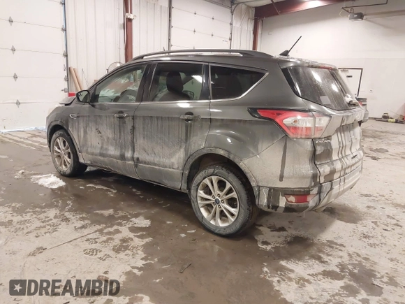 2018 Ford Escape SE with VIN 1FMCU9GD8JUA53114, listed as a IAAI auction lot 41592808 with 167,659 mi miles. Bid and sale history available at carsss.com. Image 3.