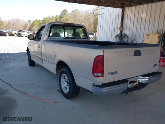 1998 Ford F-150 Standard with VIN 1FTZF1768WNA89026, listed as a IAAI auction lot 41673720 with 140,505 mi miles. Bid and sale history available at carsss.com. Image 3.