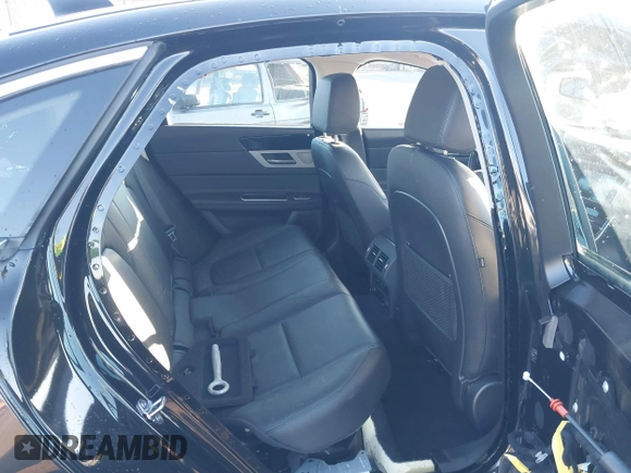 2018 Jaguar XF with VIN SAJBE4EV4JCY56439, listed as a IAAI auction lot 41390873 with 59,599 mi miles and . Bid and sale history available at DreamBid. Image 8.