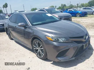 2019 Toyota Camry LE z VIN 4T1B11HKXKU164719, wystawiony jako IAAI lot #41935913 z przebiegiem 92 654 mil mil oraz . Historia ofert i sprzedaży dostępna na DreamBid. Obrazek 1.