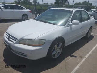 2002 Honda Accord EX z VIN 1HGCG16542A053039, wystawiony jako IAAI lot #42308687 z przebiegiem 206 864 mil mil oraz . Historia ofert i sprzedaży dostępna na DreamBid. Obrazek 2.