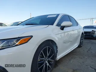 2023 Toyota Camry SE with VIN 4T1G11AK2PU799683, listed as a IAAI auction lot 41969271 with 32,332 mi miles and . Bid and sale history available at DreamBid. Image 6.