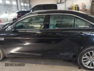 2015 Ford Taurus Limited with VIN 1FAHP2J87FG172580, listed as a IAAI auction lot 41891567 with 183,784 mi miles. Bid and sale history available at carsss.com. Image 14.