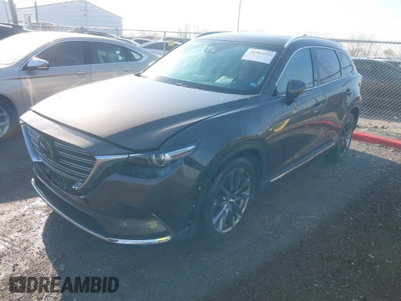 2016 Mazda CX-9 Grand Touring z VIN JM3TCBDY3G0104001, wystawiony jako IAAI lot #41961054 z przebiegiem 77 057 mil mil oraz . Historia ofert i sprzedaży dostępna na DreamBid. Obrazek 17.