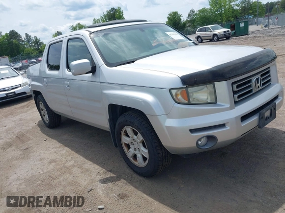 2006 Honda Ridgeline RTL with VIN 2HJYK16566H550339, listed as a IAAI auction lot 42223323 with 240,372 mi miles and . Bid and sale history available at DreamBid. Image 1.