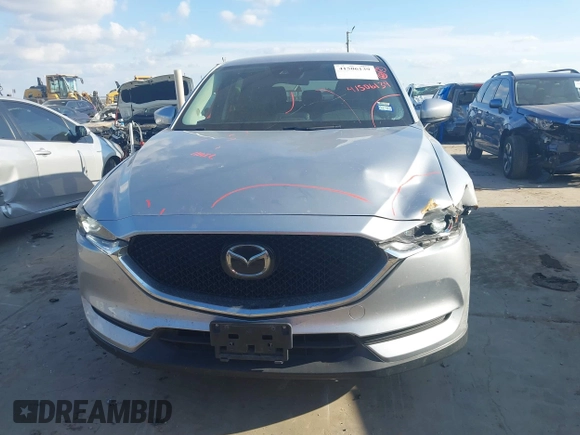 2020 Mazda CX-5 Touring with VIN JM3KFACMXL1786200, listed as a IAAI auction lot 41506139 with 121,944 mi miles. Bid and sale history available at carsss.com. Image 6.