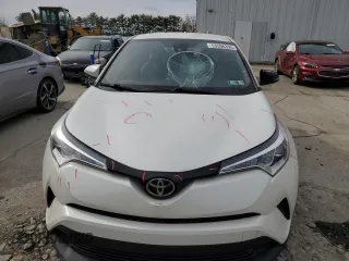 2019 Toyota C-HR XLE z VIN NMTKHMBX7KR073500, wystawiony jako Copart lot #53596395 z przebiegiem 91 934 mil mil oraz Szkoda całkowita • Salvage title. Historia ofert i sprzedaży dostępna na DreamBid. Obrazek 5.