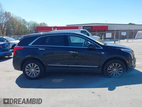 2017 Cadillac XT5 Luxury AWD z VIN 1GYKNDRS6HZ325727, wystawiony jako IAAI lot #41900538 z przebiegiem 132 375 mil mil oraz . Historia ofert i sprzedaży dostępna na DreamBid. Obrazek 13.