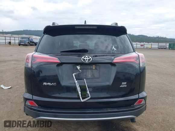2018 Toyota RAV4 SE with VIN 2T3JFREV1JW730203, listed as a IAAI auction lot 42504455 with 99,442 mi miles and . Bid and sale history available at DreamBid. Image 17.