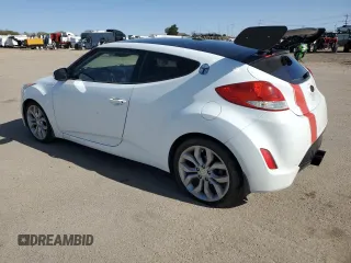 2013 Hyundai Veloster w/Gray Int z VIN KMHTC6ADXDU127194, wystawiony jako Copart lot #51751345 z przebiegiem 122 221 mil mil oraz Szkoda całkowita • Salvage title. Historia ofert i sprzedaży dostępna na DreamBid. Obrazek 2.