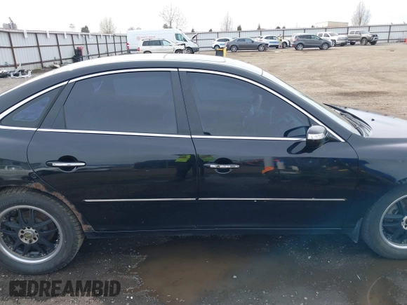 2007 Hyundai Azera SE with VIN KMHFC46F67A186034, listed as a IAAI auction lot 39181735 with 128,930 mi miles. Bid and sale history available at carsss.com. Image 13.