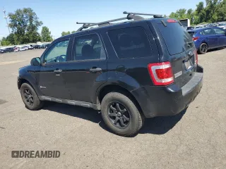 2010 Ford Escape Hybrid with VIN 1FMCU4K38AKC98072, listed as a Copart auction lot 58192375 with 123,958 mi miles and Salvage title. Bid and sale history available at DreamBid. Image 2.