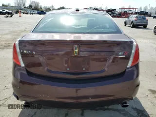 2012 Lincoln MKS EcoBoost with VIN 1LNHL9FT0CG800031, listed as a Copart auction lot 50520885 with 101,080 mi miles and Salvage title. Bid and sale history available at DreamBid. Image 6.