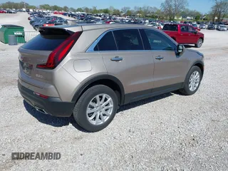 2023 Cadillac XT4 FWD Luxury with VIN 1GYAZAR42PF109650, listed as a IAAI auction lot 41921489 with 23,530 mi miles and . Bid and sale history available at DreamBid. Image 4.