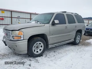 2001 GMC Yukon Denali z VIN 1GKEK63U21J222783, wystawiony jako IAAI lot #41443565 z przebiegiem Nie podano mil oraz . Historia ofert i sprzedaży dostępna na DreamBid. Obrazek 2.