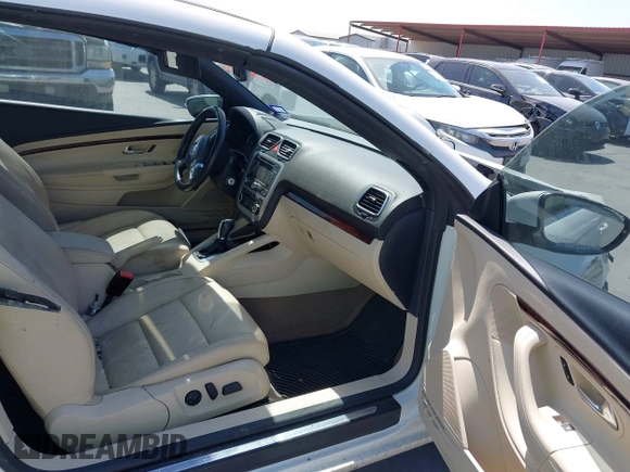 2012 Volkswagen Eos Executive with VIN WVWFW7AH9CV022169, listed as a IAAI auction lot 41795571 with 101,375 mi miles and . Bid and sale history available at DreamBid. Image 5.