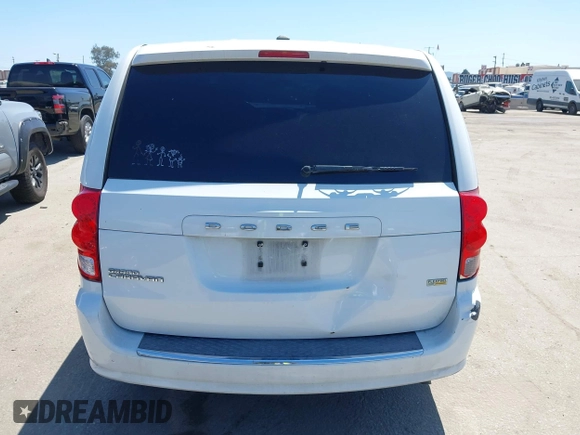 2016 Dodge Grand Caravan SE with VIN 2C4RDGBG2GR311654, listed as a IAAI auction lot 42056032 with 185,330 mi miles and . Bid and sale history available at DreamBid. Image 16.
