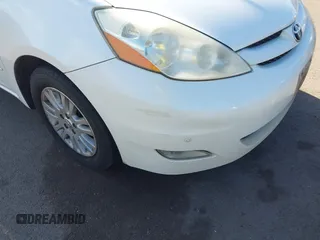 2010 Toyota Sienna XLE with VIN 5TDYK4CC3AS336590, listed as a IAAI auction lot 41798194 with 230,707 mi miles. Bid and sale history available at carsss.com. Image 6.