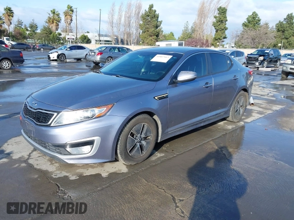 2012 Kia Optima Hybrid with VIN KNAGM4AD6C5015831, listed as a IAAI auction lot 41807913 with 156,197 mi miles. Bid and sale history available at carsss.com. Image 2.