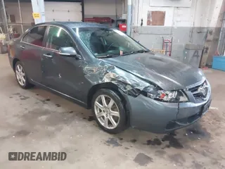 2005 Acura TSX with VIN JH4CL96865C021624, listed as a IAAI auction lot 41857232 with 212,920 mi miles. Bid and sale history available at carsss.com. Image 1.