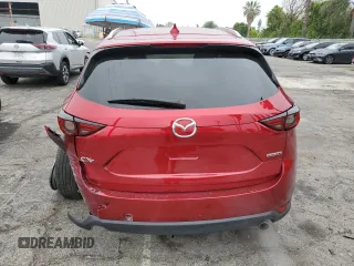 2020 Mazda CX-5 Grand Touring with VIN JM3KFADM1L1837775, listed as a Copart auction lot 55314595 with 82,359 mi miles and Clean Title. Bid and sale history available at DreamBid. Image 6.