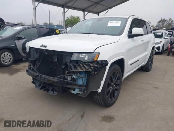 2017 Jeep Grand Cherokee Laredo with VIN 1C4RJEAG9HC805132, listed as a IAAI auction lot 42034175 with 120,949 mi miles and . Bid and sale history available at DreamBid. Image 2.