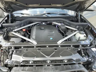 2025 BMW X5 sDrive40i z VIN 5UX13EU07S9X93779, wystawiony jako Copart lot #55974175 z przebiegiem 8 970 mil mil oraz Szkoda całkowita • Salvage title. Historia ofert i sprzedaży dostępna na DreamBid. Obrazek 12.