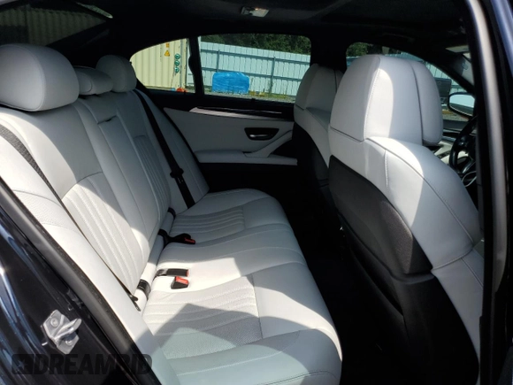 2016 BMW M5 z VIN WBSFV9C55GD595799, wystawiony jako Copart lot #65708864 z przebiegiem 104 198 mil mil oraz Szkoda całkowita • Salvage title. Historia ofert i sprzedaży dostępna na DreamBid. Obrazek 10.
