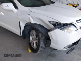 2015 Acura RDX with VIN 5J8TB4H30FL021288, listed as a IAAI auction lot 42595955 with 106,186 mi miles and . Bid and sale history available at DreamBid. Image 6.