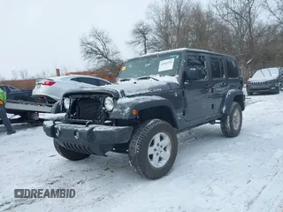 2016 Jeep Wrangler Unlimited Rubicon with VIN 1C4BJWFG7GL192698, listed as a IAAI auction lot 41603236 with 69,620 mi miles. Bid and sale history available at carsss.com. Image 18.
