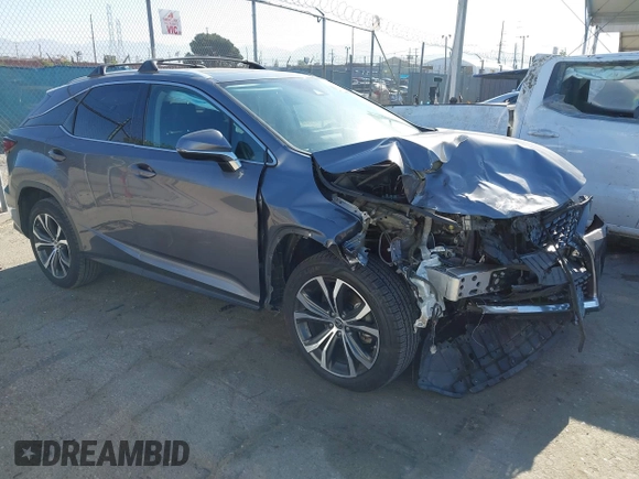 2020 Lexus RX 350 z VIN 2T2HZMAA3LC153162, wystawiony jako IAAI lot #42292460 z przebiegiem 112 913 mil mil oraz . Historia ofert i sprzedaży dostępna na DreamBid. Obrazek 1.