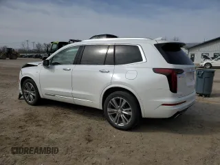 2022 Cadillac XT6 Premium Luxury with VIN 1GYKPFRS1NZ149557, listed as a Copart auction lot 49612165 with 31,425 mi miles and Salvage Title. Bid and sale history available at carsss.com. Image 2.