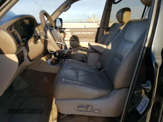 1998 Toyota Land Cruiser with VIN JT3HT05JXW0017185, listed as a Copart auction lot 84230274 with 234,747 mi miles and Clean Title. Bid and sale history available at carsss.com. Image 7.