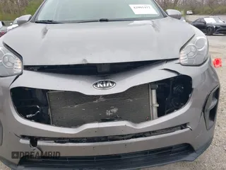 2017 Kia Sportage LX with VIN KNDPM3AC4H7231189, listed as a IAAI auction lot 42001412 with 83,550 mi miles. Bid and sale history available at carsss.com. Image 6.