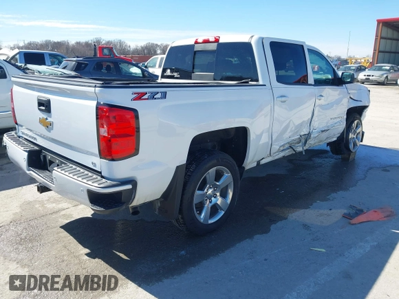 2018 Chevrolet Silverado 1500 LT with VIN 3GCUKREC3JG634354, listed as a IAAI auction lot 41734436 with 135,846 mi miles. Bid and sale history available at carsss.com. Image 4.