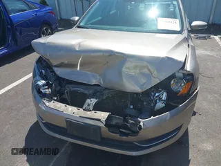 2015 Volkswagen Passat SE с VIN 1VWBV7A39FC067485, выставлен на аукционе IAAI как лот 42228324 с пробегом 147 214 миль миль и . История ставок и продаж доступна на DreamBid. Изображение 6.