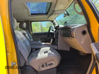 2003 Hummer H2 with VIN 5GRGN23UX3H112710, listed as a Copart auction lot 88229785 with 64,186 mi miles and Salvage Title. Bid and sale history available at carsss.com. Image 5.