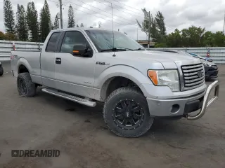 2011 Ford F-150 XL with VIN 1FTFX1ET5BFC23598, listed as a Copart auction lot 50999125 with 207,683 mi miles and Salvage Title. Bid and sale history available at carsss.com. Image 4.
