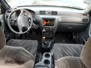 1999 Honda CR-V LX with VIN JHLRD1742XC066975, listed as a Copart auction lot 79447754 with 214,729 mi miles and Salvage Title. Bid and sale history available at carsss.com. Image 8.