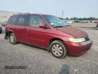 2004 Honda Odyssey EX-L with VIN 5FNRL18024B008617, listed as a Copart auction lot 58831435 with Not provided miles and Salvage title. Bid and sale history available at DreamBid. Image 4.