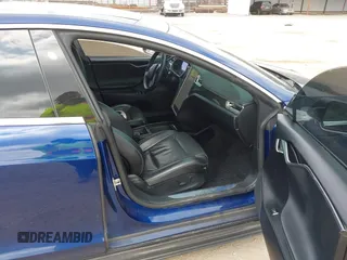 2016 Tesla Model S 90D with VIN 5YJSA1E4XGF168165, listed as a IAAI auction lot 42220139 with Not provided miles and . Bid and sale history available at DreamBid. Image 5.