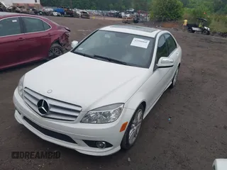 2009 Mercedes-Benz C-Class 3.0L Sport with VIN WDDGF54X59R054278, listed as a IAAI auction lot 42090960 with 107,179 mi miles. Bid and sale history available at carsss.com. Image 2.