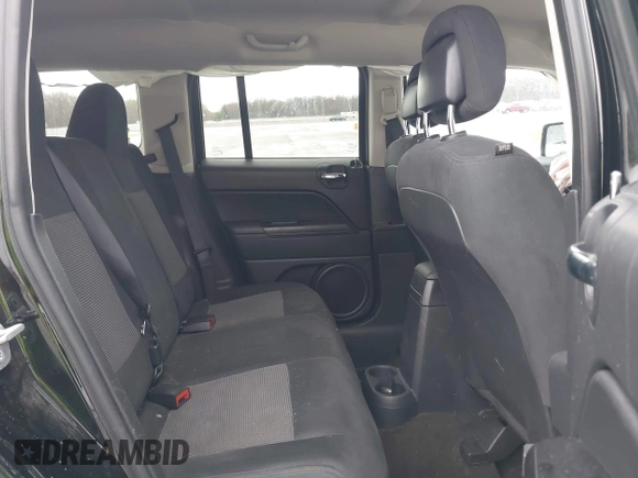 2014 Jeep Patriot Sport with VIN 1C4NJRBBXED879285, listed as a IAAI auction lot 41944152 with 103,676 mi miles. Bid and sale history available at carsss.com. Image 8.