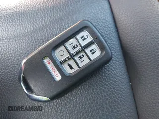 2024 Honda Odyssey Touring with VIN 5FNRL6H82RB027601, listed as a IAAI auction lot 41808680 with 25,911 mi miles and . Bid and sale history available at DreamBid. Image 11.