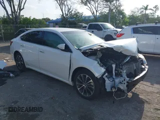 2016 Toyota Avalon Limited z VIN 4T1BK1EB4GU198017, wystawiony jako IAAI lot #42367469 z przebiegiem 12 138 mil mil oraz . Historia ofert i sprzedaży dostępna na DreamBid. Obrazek 1.