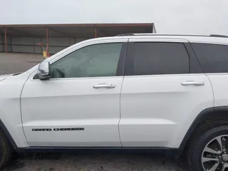 2018 Jeep Grand Cherokee Limited with VIN 1C4RJFBG8JC245999, listed as a IAAI auction lot 42345499 with 90,670 mi miles and . Bid and sale history available at DreamBid. Image 14.