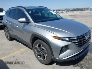 2023 Hyundai Tucson SEL z VIN 5NMJFCAE0PH221025, wystawiony jako IAAI lot #41843839 z przebiegiem 27 980 mil mil oraz . Historia ofert i sprzedaży dostępna na DreamBid. Obrazek 1.