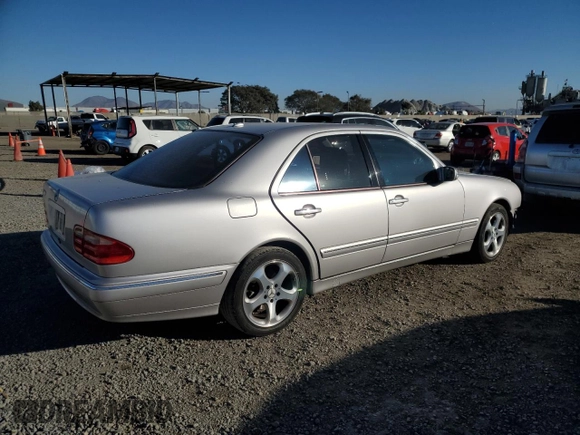 2002 Mercedes-Benz E-Class with VIN WDBJF65J82B478924, listed as a Copart auction lot 87767635 with 154,377 mi miles and Salvage Title. Bid and sale history available at carsss.com. Image 3.
