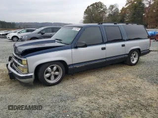 1994 GMC Suburban z VIN 1GKEC16K4RJ762562, wystawiony jako Copart lot #81242184 z przebiegiem 182 583 mil mil oraz Szkoda całkowita • Salvage title. Historia ofert i sprzedaży dostępna na DreamBid. Obrazek 1.